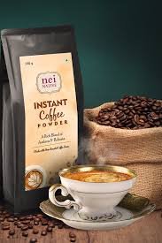 Instant coffee granules in a cup
